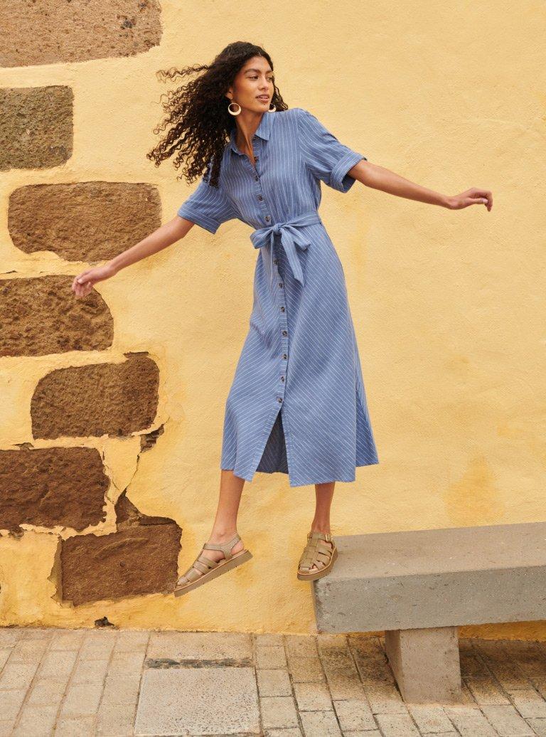 Woman in a printed linen dress